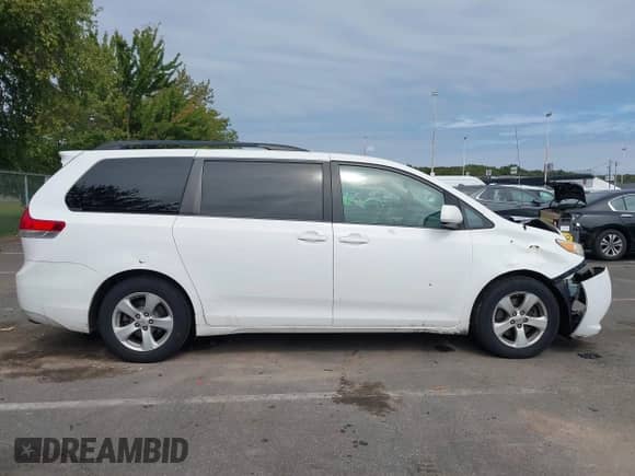 2013 Toyota Sienna LE AAS with VIN 5TDKK3DC3DS308565, listed as a IAAI auction lot 43281154 with 221,342 mi miles and . Bid and sale history available at DreamBid. Image 13.
