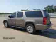 2014 Chevrolet Suburban LS with VIN 1GNSCHE05ER240761, listed as a Copart auction lot 61916395 with 234,738 mi miles and Salvage title. Bid and sale history available at DreamBid. Image 2.