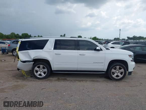 2016 Chevrolet Suburban LTZ with VIN 1GNSCJKC0GR108600, listed as a IAAI auction lot 43013240 with 168,300 mi miles and . Bid and sale history available at DreamBid. Image 13.