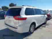 2015 Toyota Sienna XLE with VIN 5TDYK3DC3FS676841, listed as a IAAI auction lot 43497816 with 181,180 mi miles and . Bid and sale history available at DreamBid. Image 4.