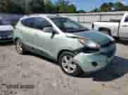 2012 Hyundai Tucson GLS with VIN KM8JU3AC7CU326017, listed as a Copart auction lot 71749405 with 279,791 mi miles and Salvage title. Bid and sale history available at DreamBid. Image 4.