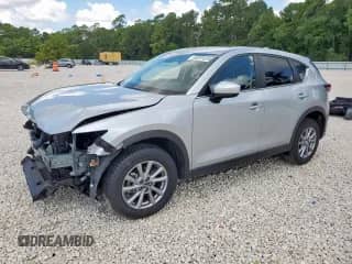 2022 Mazda CX-5 S Preferred z VIN JM3KFBCM2N0563289, wystawiony jako Copart lot #68281525 z przebiegiem 43 412 mil mil oraz Czysty tytuł • Clean title. Historia ofert i sprzedaży dostępna na DreamBid. Obrazek 1.