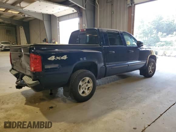 2007 Dodge Dakota SLT with VIN 1D7HW48PX7S144637, listed as a Copart auction lot 66597435 with 151,375 mi miles and Salvage title. Bid and sale history available at DreamBid. Image 3.