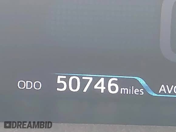 2018 Toyota Prius Plus z VIN JTDKARFP9J3089162, wystawiony jako IAAI lot #42544642 z przebiegiem 50 746 mil mil oraz . Historia ofert i sprzedaży dostępna na DreamBid. Obrazek 16.