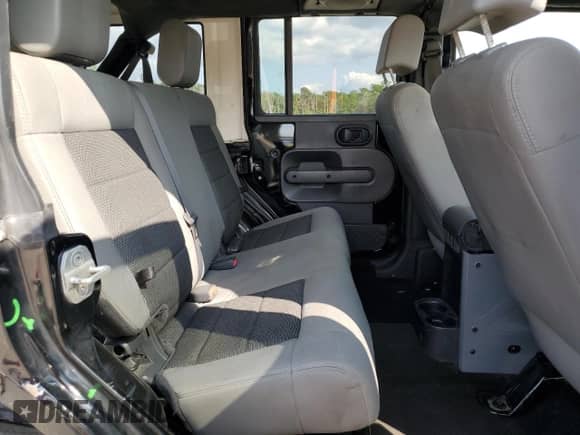 2008 Jeep Wrangler Unlimited X z VIN 1J4GA391X8L616091, wystawiony jako Copart lot #71962505 z przebiegiem 130 040 mil mil oraz Szkoda całkowita • Salvage title. Historia ofert i sprzedaży dostępna na DreamBid. Obrazek 11.