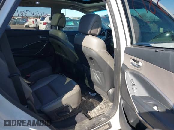 2016 Hyundai Santa Fe Limited with VIN KM8SRDHF0GU136769, listed as a IAAI auction lot 41643817 with 155,953 mi miles and . Bid and sale history available at DreamBid. Image 8.