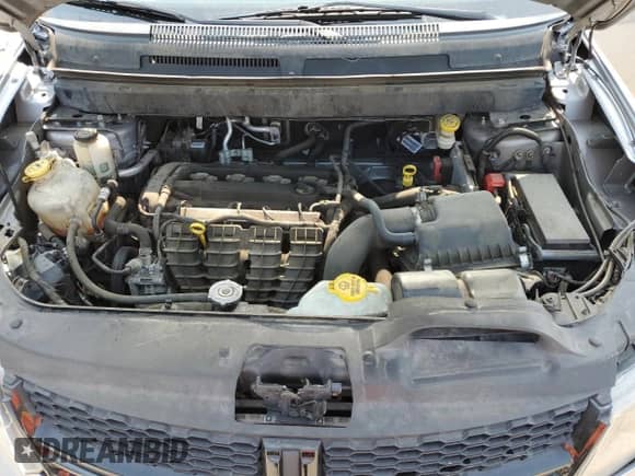 2016 Dodge Journey Crossroad z VIN 3C4PDCGB5GT107229, wystawiony jako Copart lot #59345625 z przebiegiem 105 070 mil mil oraz Szkoda całkowita • Salvage title. Historia ofert i sprzedaży dostępna na DreamBid. Obrazek 13.