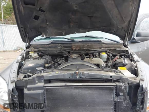 2006 Dodge 3500 Laramie z VIN 3D7LX38C06G143095, wystawiony jako IAAI lot #40889368 z przebiegiem Nie podano mil oraz . Historia ofert i sprzedaży dostępna na DreamBid. Obrazek 10.