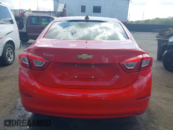 2018 Chevrolet Cruze LS z VIN 1G1BC5SM2J7239614, wystawiony jako IAAI lot #43178427 z przebiegiem 74 101 mil mil oraz . Historia ofert i sprzedaży dostępna na DreamBid. Obrazek 16.