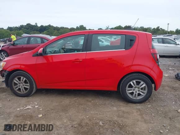 2015 Chevrolet Sonic LT with VIN 1G1JC6SH8F4140342, listed as a IAAI auction lot 43275352 with 229,235 mi miles and . Bid and sale history available at DreamBid. Image 14.