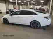 2021 Hyundai Elantra N Line z VIN KMHLR4AF2MU104884, wystawiony jako Copart lot #57500015 z przebiegiem 55 222 mil mil oraz Szkoda całkowita • Salvage title. Historia ofert i sprzedaży dostępna na DreamBid. Obrazek 2.