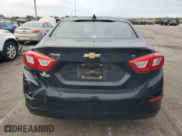 2016 Chevrolet Cruze LT z VIN 1G1BE5SM5G7233115, wystawiony jako Copart lot #86306055 z przebiegiem 100 763 mil mil oraz Szkoda całkowita • Salvage title. Historia ofert i sprzedaży dostępna na DreamBid. Obrazek 6.