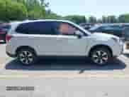 2018 Subaru Forester Premium z VIN JF2SJAGC9JH465554, wystawiony jako IAAI lot #42656773 z przebiegiem Nie podano mil oraz . Historia ofert i sprzedaży dostępna na DreamBid. Obrazek 12.