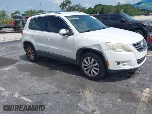 2011 Volkswagen Tiguan S with VIN WVGAV7AX9BW514225, listed as a IAAI auction lot 42461785 with 128,973 mi miles and . Bid and sale history available at DreamBid. Image 1.