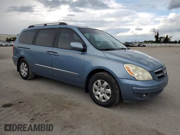 2007 Hyundai Entourage GLS with VIN KNDMC233376032281, listed as a Copart auction lot 73967304 with 252,331 mi miles and Salvage title. Bid and sale history available at DreamBid. Image 4.