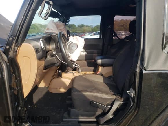 2014 Jeep Wrangler Sahara с VIN 1C4AJWBG0EL125620, выставлен на аукционе Copart как лот 81502725 с пробегом 143 297 миль миль и Списание • Salvage title. История ставок и продаж доступна на DreamBid. Изображение 7.