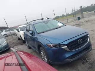 2023 Mazda CX-5 S Carbon Edition z VIN JM3KFBCM0P0195827, wystawiony jako IAAI lot #42905023 z przebiegiem 31 766 mil mil oraz . Historia ofert i sprzedaży dostępna na DreamBid. Obrazek 1.