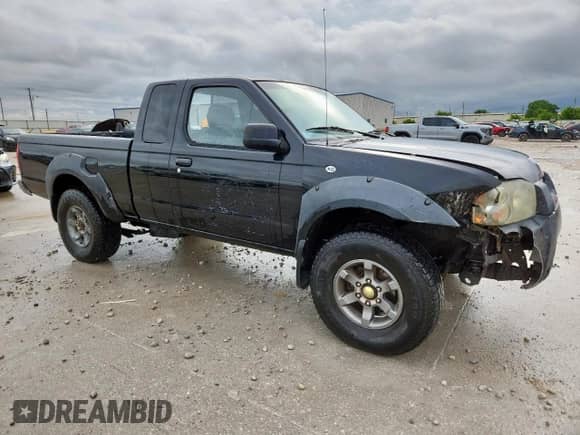 2001 Nissan Frontier SE Desert Runner with VIN 1N6ED26T91C394912, listed as a Copart auction lot 60559095 with 245,633 mi miles and Clean title. Bid and sale history available at DreamBid. Image 4.