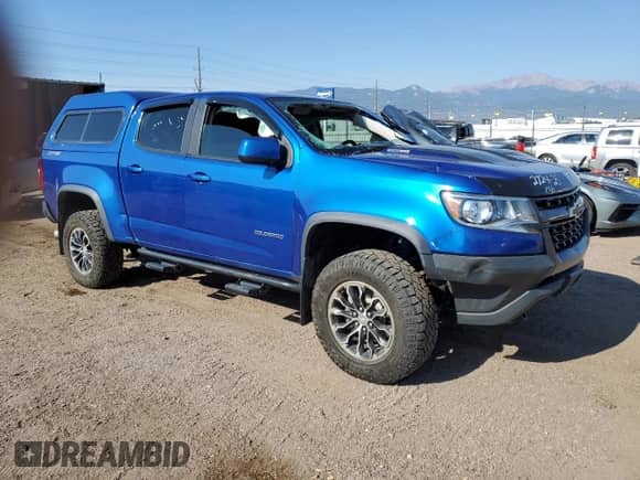 2019 Chevrolet Colorado 4WD ZR2 with VIN 1GCPTEE12K1307025, listed as a Copart auction lot 69978555 with 103,041 mi miles and Salvage title. Bid and sale history available at DreamBid. Image 4.