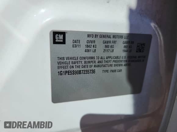 2011 Chevrolet Cruze 1FL z VIN 1G1PE5S90B7235736, wystawiony jako Copart lot #70587245 z przebiegiem 185 810 mil mil oraz Szkoda całkowita • Salvage title. Historia ofert i sprzedaży dostępna na DreamBid. Obrazek 12.