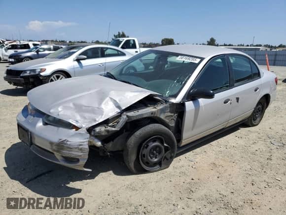 2000 Saturn SL with VIN 1G8ZH5280YZ121421, listed as a Copart auction lot 58169285 with 226,014 mi miles and Salvage title. Bid and sale history available at DreamBid. Image 1.