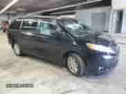 2014 Toyota Sienna XLE with VIN 5TDYK3DC8ES464113, listed as a Copart auction lot 82118295 with 142,513 mi miles and Salvage title. Bid and sale history available at DreamBid. Image 4.
