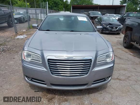 2014 Chrysler 300 with VIN 2C3CCARG7EH163424, listed as a IAAI auction lot 42596216 with 132,943 mi miles and . Bid and sale history available at DreamBid. Image 12.