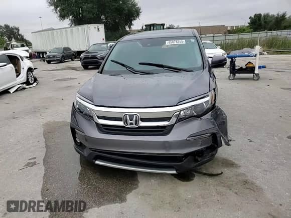 2020 Honda Pilot EX-L z VIN 5FNYF5H56LB007166, wystawiony jako Copart lot #85878255 z przebiegiem 42 417 mil mil oraz Nie do naprawy • Non repairable. Historia ofert i sprzedaży dostępna na DreamBid. Obrazek 14.