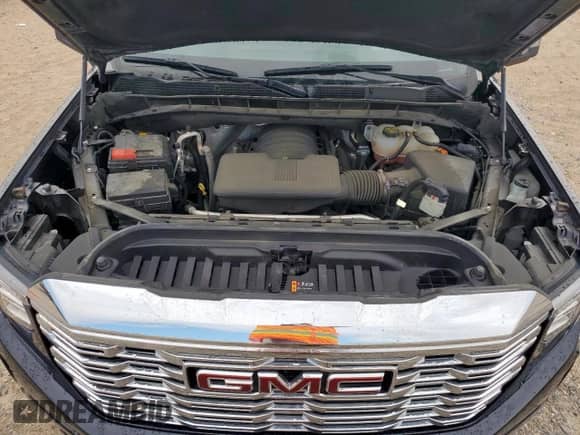 2023 GMC Sierra 1500 Denali z VIN 3GTUUGED9PG208796, wystawiony jako Copart lot #66319535 z przebiegiem 64 409 mil mil oraz Szkoda całkowita • Salvage title. Historia ofert i sprzedaży dostępna na DreamBid. Obrazek 11.