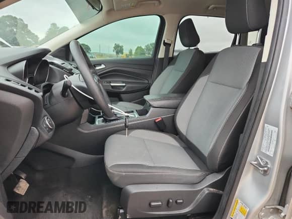 2018 Ford Escape SE with VIN 1FMCU9GD2JUB39549, listed as a Copart auction lot 84175385 with 127,811 mi miles and Salvage title. Bid and sale history available at DreamBid. Image 7.