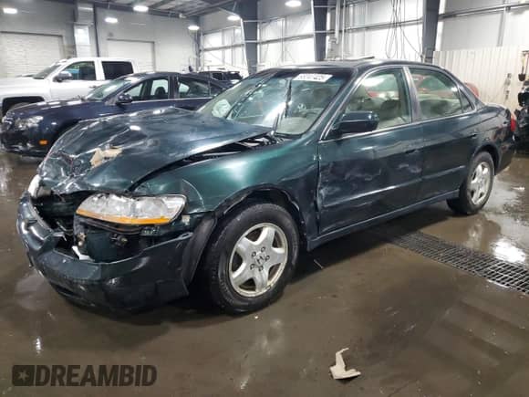1998 Honda Accord EX with VIN 1HGCG1659WA023184, listed as a Copart auction lot 63247425 with 194,320 mi miles and Salvage title. Bid and sale history available at DreamBid. Image 1.