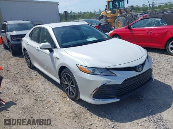 2021 Toyota Camry Hybrid XLE with VIN 4T1F31AKXMU556673, listed as a IAAI auction lot 42018439 with 56,429 mi miles and . Bid and sale history available at DreamBid. Image 1.