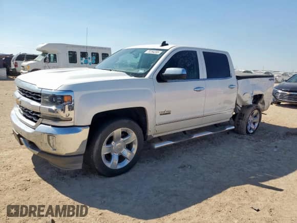 2018 Chevrolet Silverado 1500 LTZ z VIN 3GCUKSEC7JG536936, wystawiony jako Copart lot #70294205 z przebiegiem 158 903 mil mil oraz Szkoda całkowita • Salvage title. Historia ofert i sprzedaży dostępna na DreamBid. Obrazek 1.