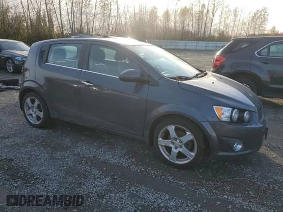 2012 Chevrolet Sonic LTZ с VIN 1G1JF6SB0C4224346, выставлен на аукционе Copart как лот 77745314 с пробегом 134 981 миль миль и Чистый • Clean title. История ставок и продаж доступна на DreamBid. Изображение 4.