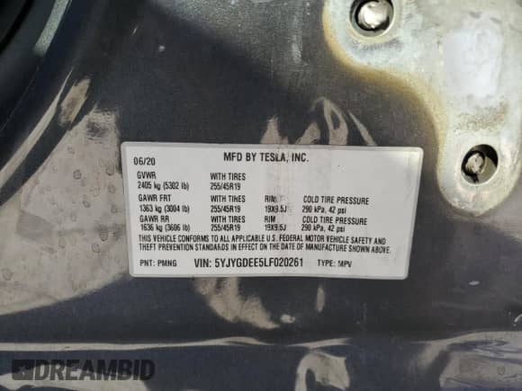 2020 Tesla Model Y Long Range z VIN 5YJYGDEE5LF020261, wystawiony jako Copart lot #70729315 z przebiegiem 74 406 mil mil oraz Szkoda całkowita • Salvage title. Historia ofert i sprzedaży dostępna na DreamBid. Obrazek 13.