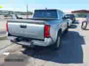 2024 Toyota Tacoma TRD Off Road with VIN 3TMLB5JN8RM010395, listed as a IAAI auction lot 43375716 with 20,319 mi miles and . Bid and sale history available at DreamBid. Image 4.