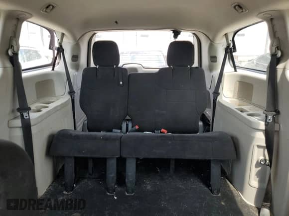 2013 Dodge Grand Caravan American Value с VIN 2C4RDGBG0DR765140, выставлен на аукционе Copart как лот 55219745 с пробегом 119 987 миль миль и Списание • Salvage title. История ставок и продаж доступна на DreamBid. Изображение 10.