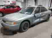 1995 Honda Accord LX with VIN 1HGCD5637SA100093, listed as a IAAI auction lot 43136050 with 153,199 mi miles and . Bid and sale history available at DreamBid. Image 17.