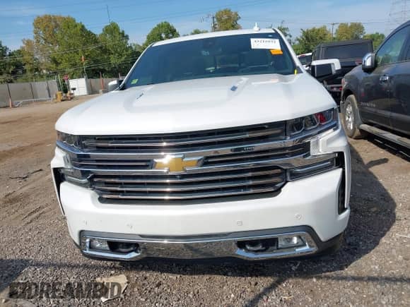 2021 Chevrolet Silverado 1500 High Country with VIN 1GCUYHEL3MZ272071, listed as a IAAI auction lot 43215932 with 113,190 mi miles and . Bid and sale history available at DreamBid. Image 13.