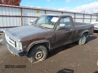 1989 Dodge Dakota SLT z VIN 1B7FL26X5KS160822, wystawiony jako IAAI lot #43544411 z przebiegiem 221 723 mil mil oraz . Historia ofert i sprzedaży dostępna na DreamBid. Obrazek 2.