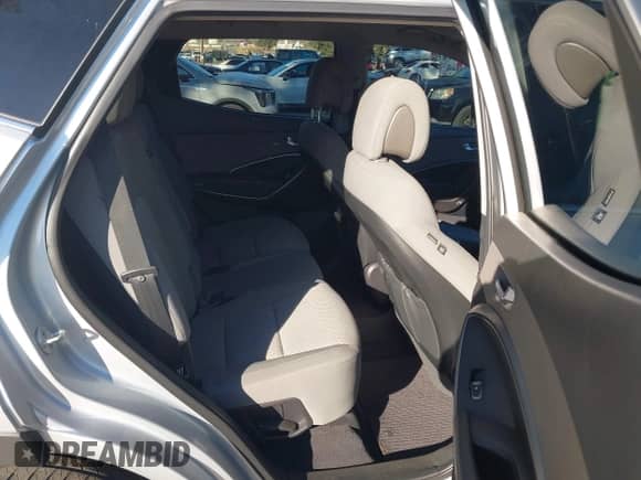 2018 Hyundai Santa Fe 2.4L with VIN 5XYZT3LB3JG565285, listed as a IAAI auction lot 43486666 with 124,869 mi miles and . Bid and sale history available at DreamBid. Image 8.