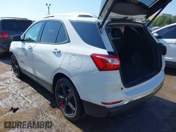 2021 Chevrolet Equinox Premier with VIN 2GNAXNEV9M6120241, listed as a IAAI auction lot 42222928 with 104,274 mi miles and . Bid and sale history available at DreamBid. Image 3.