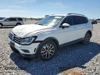 2021 Volkswagen Tiguan SE z VIN 3VV2B7AX3MM099019, wystawiony jako Copart lot #86211405 z przebiegiem 126 436 mil mil oraz Nie do naprawy • Non repairable. Historia ofert i sprzedaży dostępna na DreamBid. Obrazek 1.