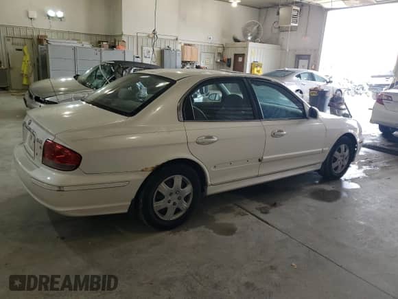 2002 Hyundai Sonata z VIN KMHWF25HX2A716609, wystawiony jako Copart lot #78454424 z przebiegiem 283 736 mil mil oraz Czysty tytuł • Clean title. Historia ofert i sprzedaży dostępna na DreamBid. Obrazek 3.