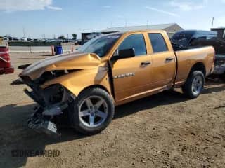 2012 Ram 1500 Express z VIN 1C6RD7FT0CS282484, wystawiony jako Copart lot #70900705 z przebiegiem 111 202 mil mil oraz Szkoda całkowita • Salvage title. Historia ofert i sprzedaży dostępna na DreamBid. Obrazek 1.