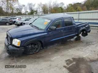 2006 Dodge Dakota SLT с VIN 1D7HW48K06S718102, выставлен на аукционе Copart как лот 89479615 с пробегом Не указан миль и Списание • Salvage title. История ставок и продаж доступна на DreamBid. Изображение 1.
