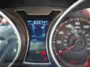 2012 Hyundai Veloster w/Gray Int z VIN KMHTC6AD1CU020968, wystawiony jako IAAI lot #43022090 z przebiegiem 165 974 mil mil oraz . Historia ofert i sprzedaży dostępna na DreamBid. Obrazek 7.