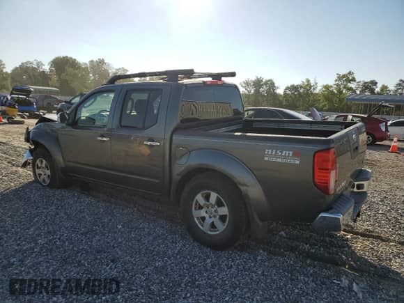 2005 Nissan Frontier Nismo with VIN 1N6AD07W35C443586, listed as a Copart auction lot 80103485 with 121,008 mi miles and Salvage title. Bid and sale history available at DreamBid. Image 2.