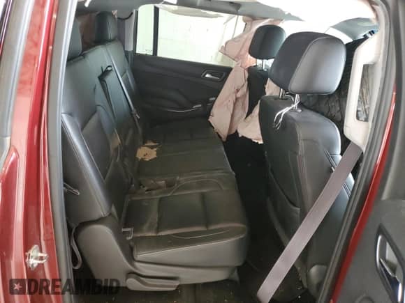 2017 Chevrolet Suburban LT z VIN 1GNSKHKCXHR223055, wystawiony jako Copart lot #60140275 z przebiegiem Nie podano mil oraz Szkoda całkowita • Salvage title. Historia ofert i sprzedaży dostępna na DreamBid. Obrazek 11.