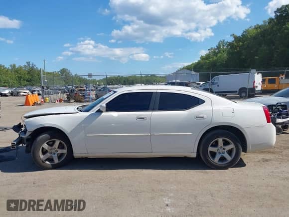 2010 Dodge Charger SXT with VIN 2B3CA3CV3AH156048, listed as a IAAI auction lot 43095196 with 180,298 mi miles and . Bid and sale history available at DreamBid. Image 14.